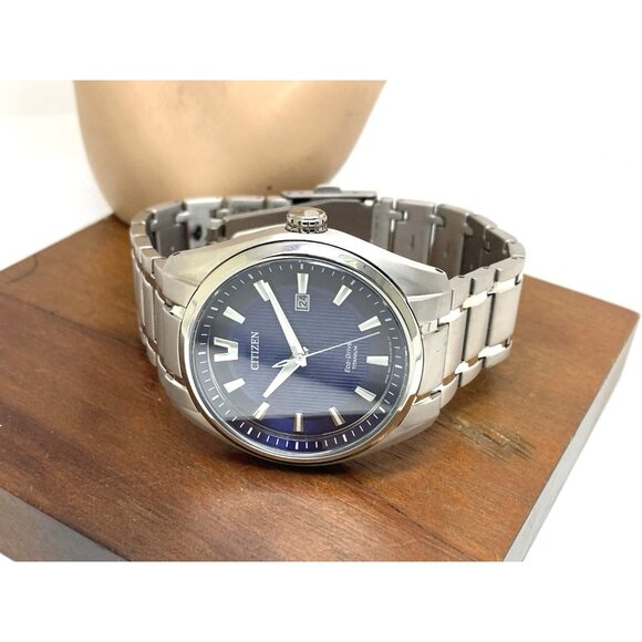 Citizen Men's Watch AW1240-57L Eco Drive Super Titanium Blue Dial Date 42mm - Picture 9 of 15